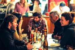 secret-garden-hostel-people-talking